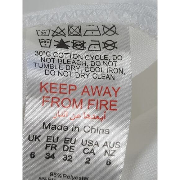 Pretty Little Thing White Satin Bardot twist front crop top women's blouse Sz 2 - Picture 11 of 12